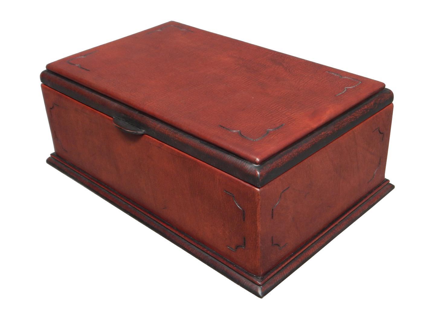 leather box with a cut design on the top
